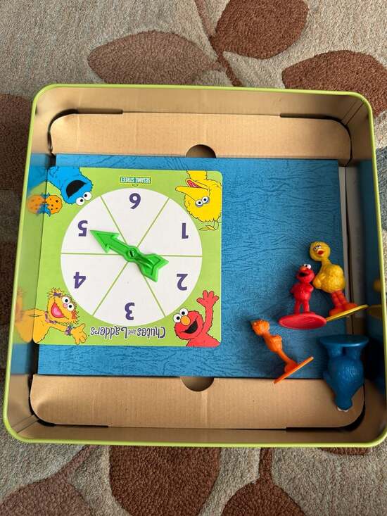 Chutes and Ladders Sesame Street Edition Collector's Tin with 24 Piece Puzzle - Picture 2 of 2
